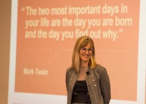 Caroline Hall addressing alumni at the Stanford University Graduate School of Business